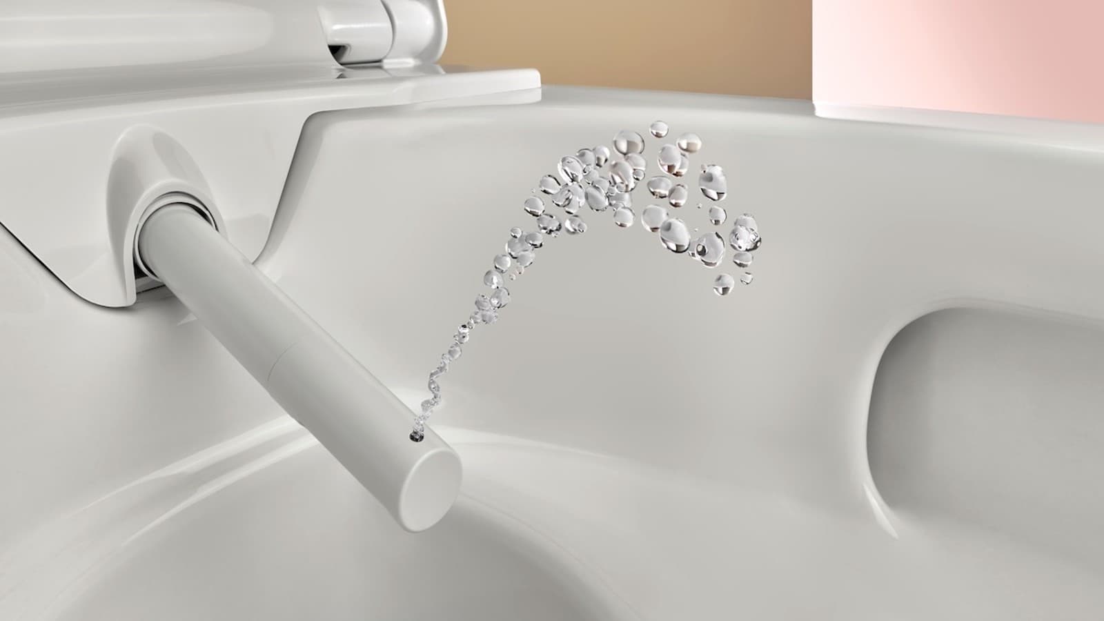 Toilet with cleaning function: shower spray of the Geberit AquaClean Alba shower toilet Toilet with cleaning function: shower spray of the Geberit AquaClean Alba shower toilet